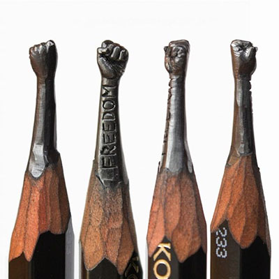 Pencil carvings: Fists